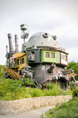 Howl's castle from “Howl's Moving Castle” with its mishmash of parts and smoke stacks